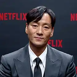 Park Hae-soo in formal attire