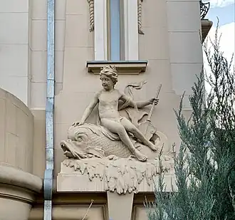 Beaux Arts putto on the Vasile Urseanu House, the current Bucharest Observatory (Bulevardul Lascăr Catargiu no. 21), Bucharest, Romania, designed by Ion D. Berindey, 1908–1910[18]