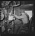 Ricardo, New Mexico. Engineer in his cab about to start the train along the Atchison, Topeka, and Santa Fe Railroad between Clovis and Vaughn, New Mexico.