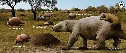 Illustration of some of the extinct megafauna, including Glyptotherium, that lived in the grassland ecosystem present in the Brazilian Intertropical region. Glyptotherium can be seen in the background towards the right.