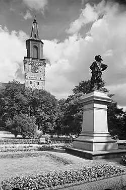 The statue faces the Turku Cathedral.