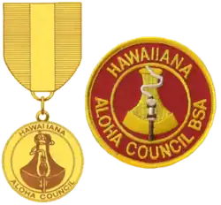 the badge is a round red patch with a gold border; the outer edge has the text Hawaiiana and Aloha Council; the inner circle has the image of a poi pounding stone with a flaming torch in front; the medal uses the same image as the badge suspended from a red and gold ribbon