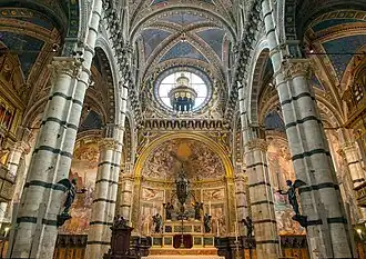 High altar by Baldassare Peruzzi (1532) and suspended Ciborium by Vecchietta