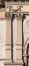 Paired Corinthian pilasters with high bases on the county courthouse in Sidney, Ohio
