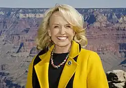 Photograph of Jan Brewer in front of the Grand Canyon