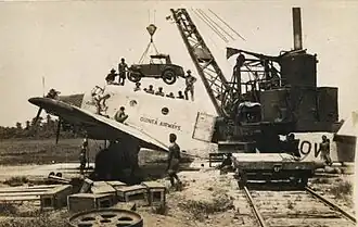 Loading the Austin 7 at Lae