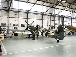 Spitfire Mk IX MK356 inside the Battle of Britain Memorial Flight hangar at RAF Coningsby.