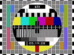 Off-air screen capture of PAL Philips circle pattern used by bTV transmitted with a digital clock between 2000 and 2002.