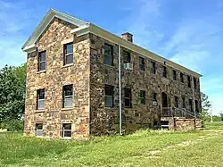 1937 William McCombs Hall in May 2025