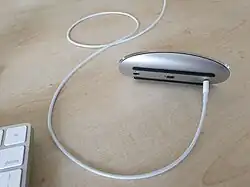 The charging port of the second-generation Magic Mouse is located on its underside, preventing the mouse from being used while charging.