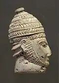 Head of a warrior; 1300-1200 BC; ivory; height: 8&nbsp;cm; National Archaeological Museum (Athens)[14]