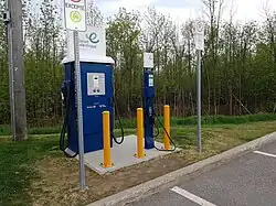 A charging site in Quebec, Canada with a 50 kW CHAdeMO / CCS "combo" DC fast charger and a Level 2 AC connector.