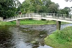 Bridge over the Coquet at Rothbury. This pedestrian bridge links the car park (right) with the town (left).