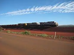 The Rio Tinto Mining Company in Western Australia runs the world's largest network of driverless trains, with 1,700&nbsp;km (1,100&nbsp;mi) of freight railways run by an increasing number of completely unattended trains.