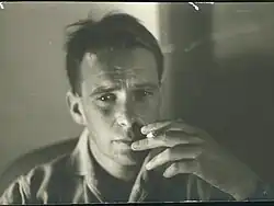 1955 picture of Bruno Touschek in Rome smoking a cigarette