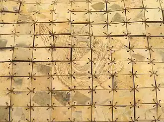 Close up detail of a jade burial suit with replaced copper wire in the George Walter Vincent Smith Art Museum