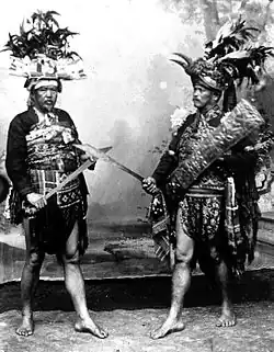 Minahasan men with ancient war equipment