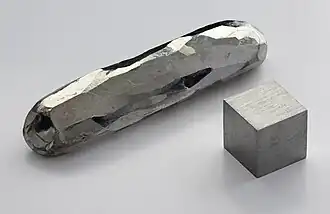 A picture of a piece of elemental cadmium it is a hard metallic lustrous metal.