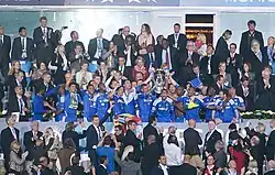 Chelsea received the trophy from UEFA President Michel Platini.