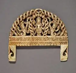 Comb with Vishnu adored by serpents; 1750–1800; ivory with traces of paint; 6.99 by 7.94 centimetres (2.75&nbsp;in ×&nbsp;3.13&nbsp;in); from Nepal; Los Angeles County Museum of Art