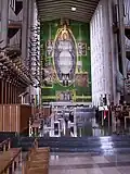 Graham Sutherland's Christ tapestry in the rebuilt Coventry Cathedral; 1962.[159]