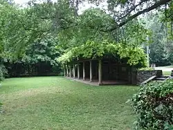 A colonnade or pergola remaining from the Curtis mansion