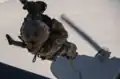 SOF operator fast-roping from a heli during Eager Lion.