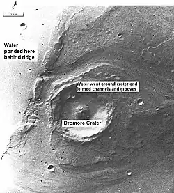 Large floods of water likely eroded the channels around the crater. (Lunae Palus quadrangle)