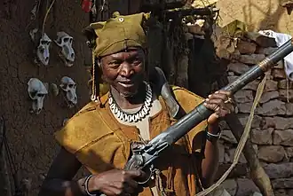 Image 10A Dogon hunter with an old flintlock rifle still in use. (from Culture of Mali)