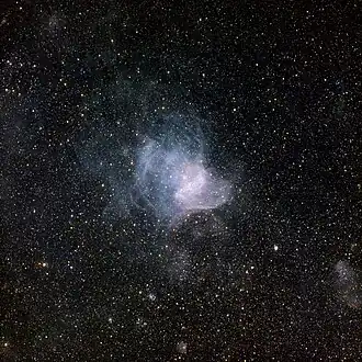 Image of NGC 346 with a 30 arcminute wide field of view showing the wispy nebular structure around it.