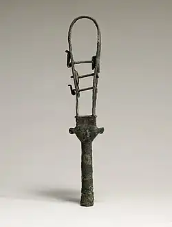 Sistrum with the face of the goddess Hathor depicted with cow ears; 380–250&nbsp;BC; bronze; 36.3&nbsp;cm; Walters Art Museum (Baltimore, US)
