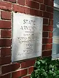 The cornerstone for the Enid Armory reads: "State Armory, built by Works Progress Administration 1936, W.S. Key, State Administrator.
