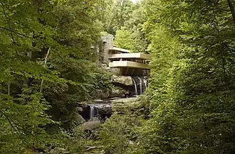 Fallingwater as seen from Bear Run downstream of the house. There are two waterfalls in front of the house.