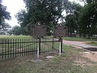 Historic Marker Signs at Ferry Place and Peck Mounds.