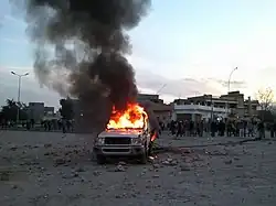 First demonstrations calling for the downfall of the regime in Bayda, Libya. During the demonstration, burning a police car, at the crossroads of At-Talhi, now known as the crossroads of the spark, on 16 February 2011
