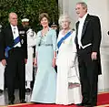 President George W. Bush and First Lady Laura Bush with Queen Elizabeth II and Prince Philip, Duke of Edinburgh at the beginning of an official dinner at the White House, 2007