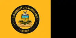 Yellow and black flag with the circular Seal of Anambra centered on the yellow part.