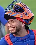 Francisco Álvarez of the New York Mets with a PitchCom extension tube/earpiece in his ear