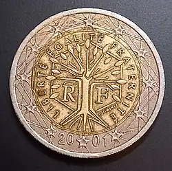 French 2 Euro coin 2011. The design features a tree symbolising life, continuity and growth, standing within a hexagon and encircled by the motto of the French Republic, "Liberté, Egalité, Fraternité" (Liberty, equality, fraternity)
