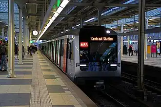 An M5 series train arriving at Amstel station