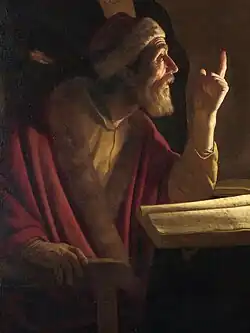 Painting of Caiaphas in profile. He is pointing his finger in condemnation.
