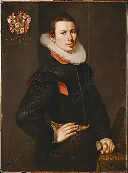 Profile of stone face on mountainside, with 3 workers.