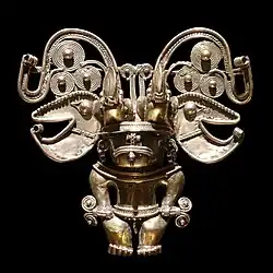 Anthropomorphic pendant; 18th century; gold; height: 13&nbsp;cm (5.1&nbsp;in), width: 13&nbsp;cm (5.1&nbsp;in), depth: 4.5&nbsp;cm (1.7&nbsp;in); Musée du Quai Branly (Paris)