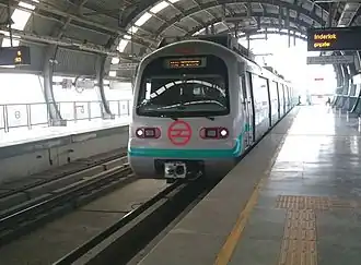 A modern train pulling into a station