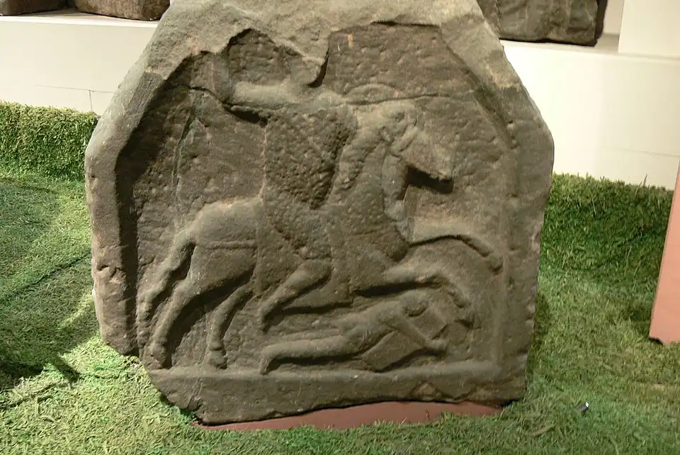 Funerary relief of a late (4th/5th century?) Roman cavalryman trampling a barbarian warrior, Roman Britain (Chester, Grosvenor Museum)