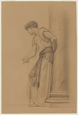 Youth leaning against pillar