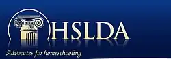 Logo of the Home School Legal Defense Association, consisting of the top of a pillar in a circle and the text "HSLDA: Advocates for homeschooling" in gold ink on a dark blue background.