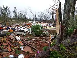 EF4 damage: Brick home reduced to piles of rubble. Above-ground structures are almost completely vulnerable to EF4 tornadoes, which level well-built structures, toss heavy vehicles through the air, and uproot trees, turning them into flying missiles. Around 1.1% of annual tornadoes in the U.S. are rated EF4.