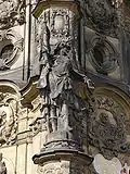 18th century Baroque sculpture of Saint Maurice on the Holy Trinity Column in Olomouc, the Czech Republic.