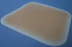 A picture of a large hydrocolloid dressing.